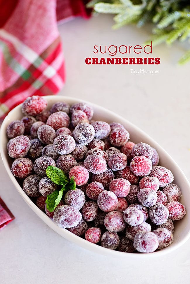 sugared cranberries in an oval bowl