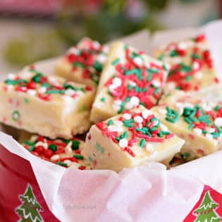 White Chocolate Christmas Fudge in a holiday tin