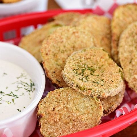 delicious fried pickles in a red basket