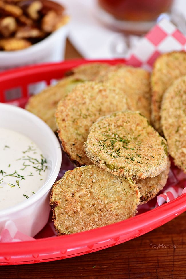 delicious fried pickles in a red basket