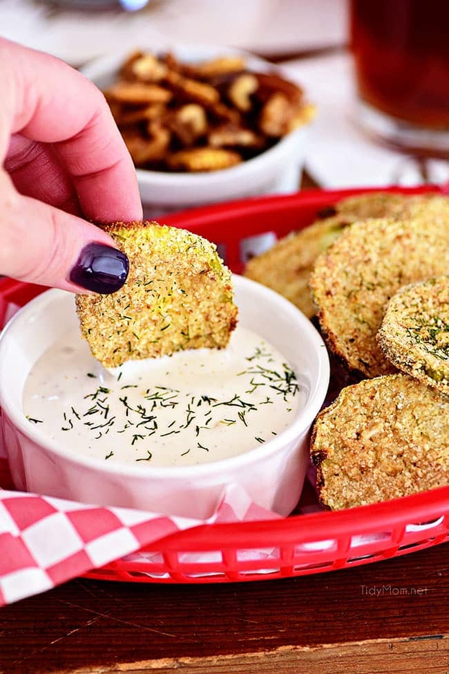 oven fried pickles in a basket with ranch dressing