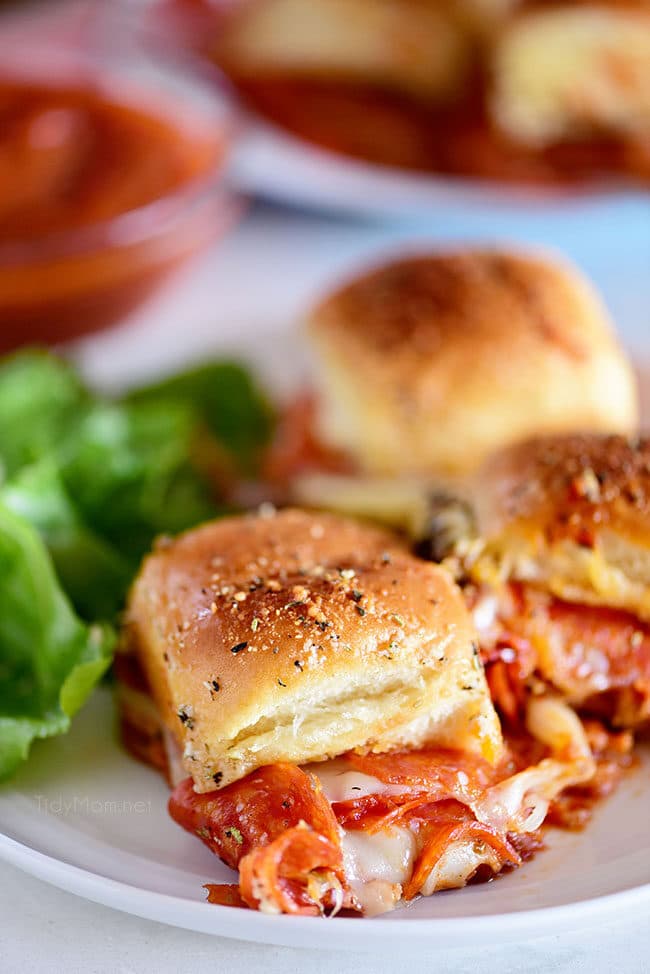 three pepperoni Pizza Sliders on a plate