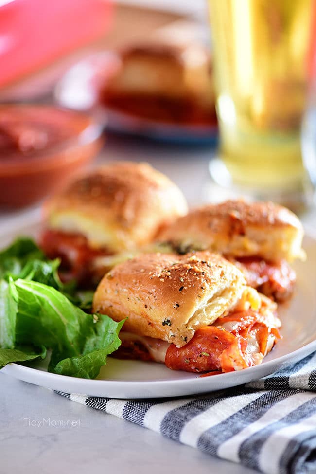 three pepperoni Pizza Sliders on a plate