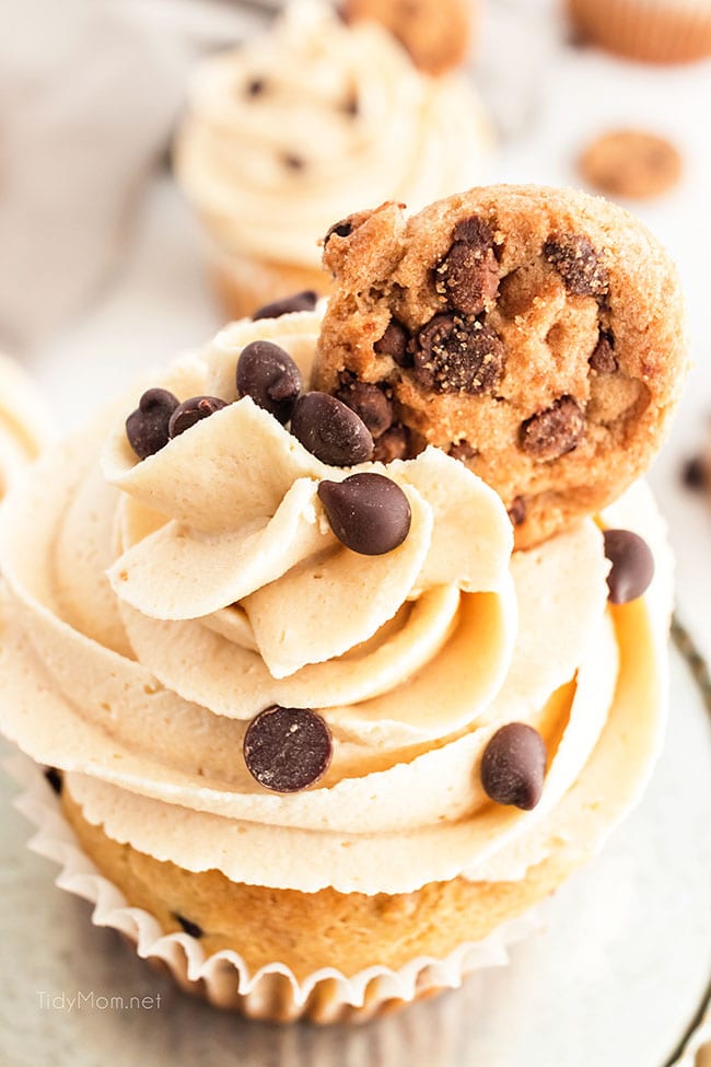 Cookie Dough Cupcakes with Cookie Dough Frosting with a tiny chocolate chip cookie on top