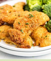 chicken tenders piled on a plate