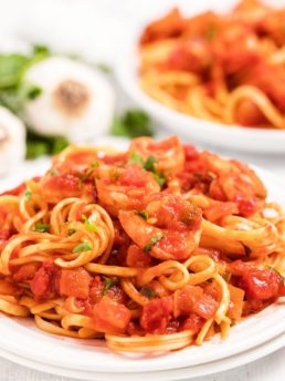 Shrimp Spaghetti on white plates