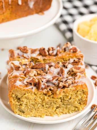 a slice of hummingbird cake on a plate