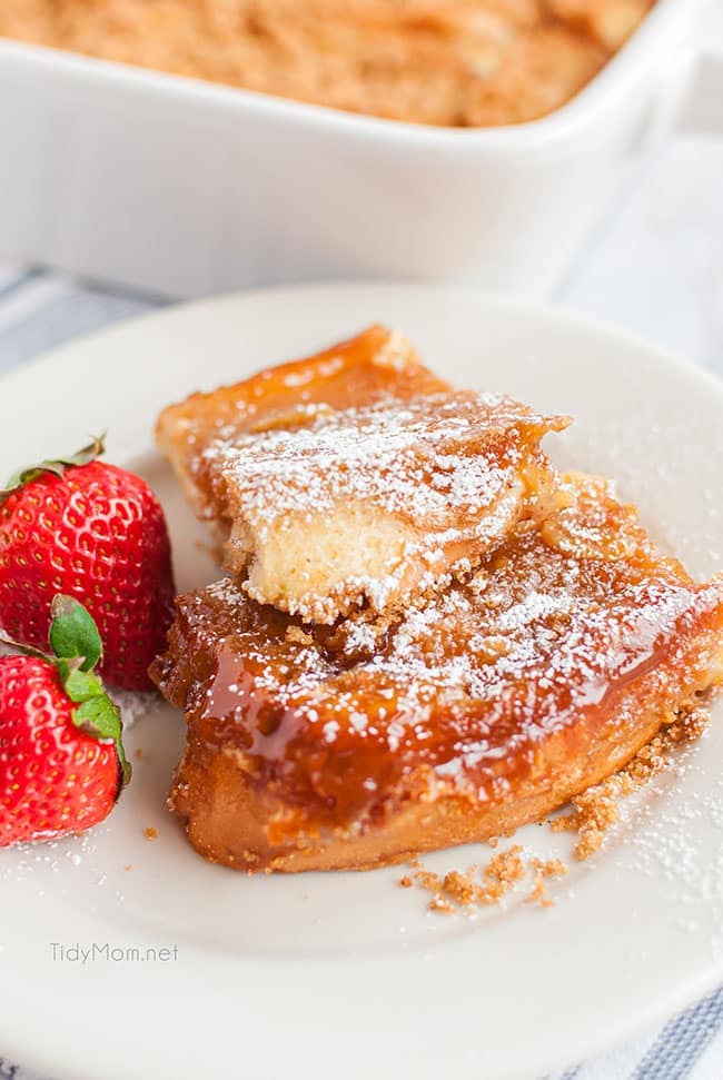 baked french toast on a plate with strawberries