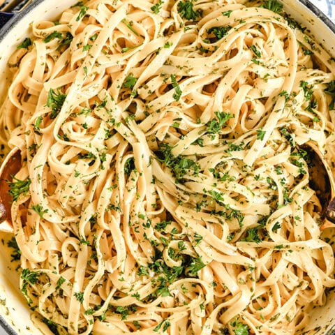 close up of fettuccine alfredo in a pot