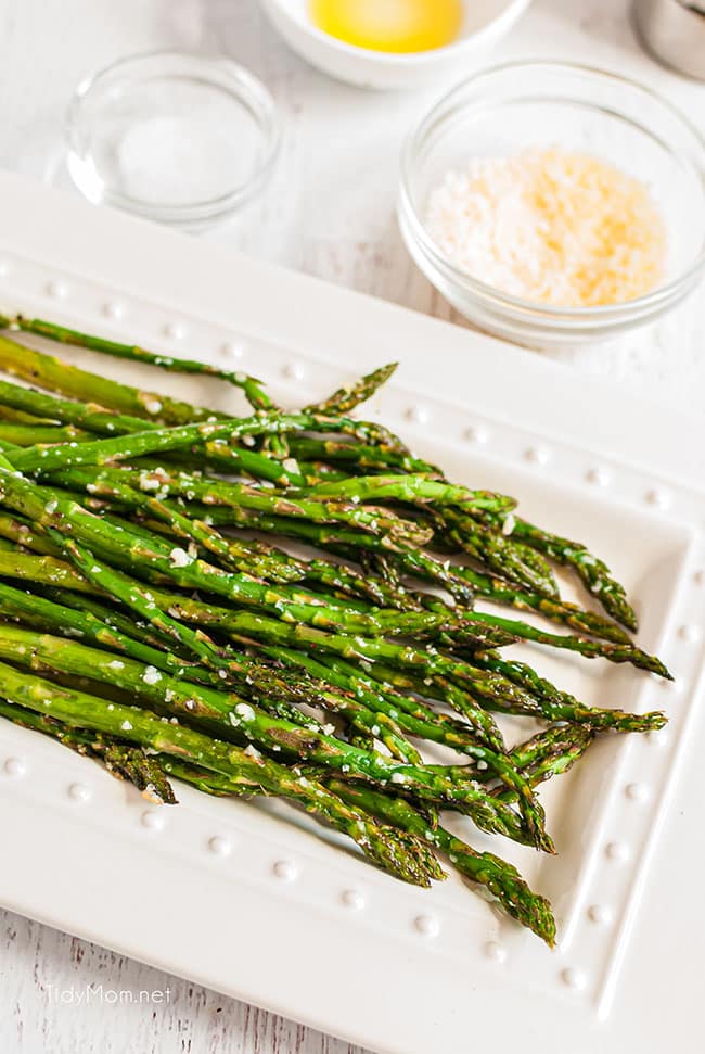 roasted asparagus on a white plate