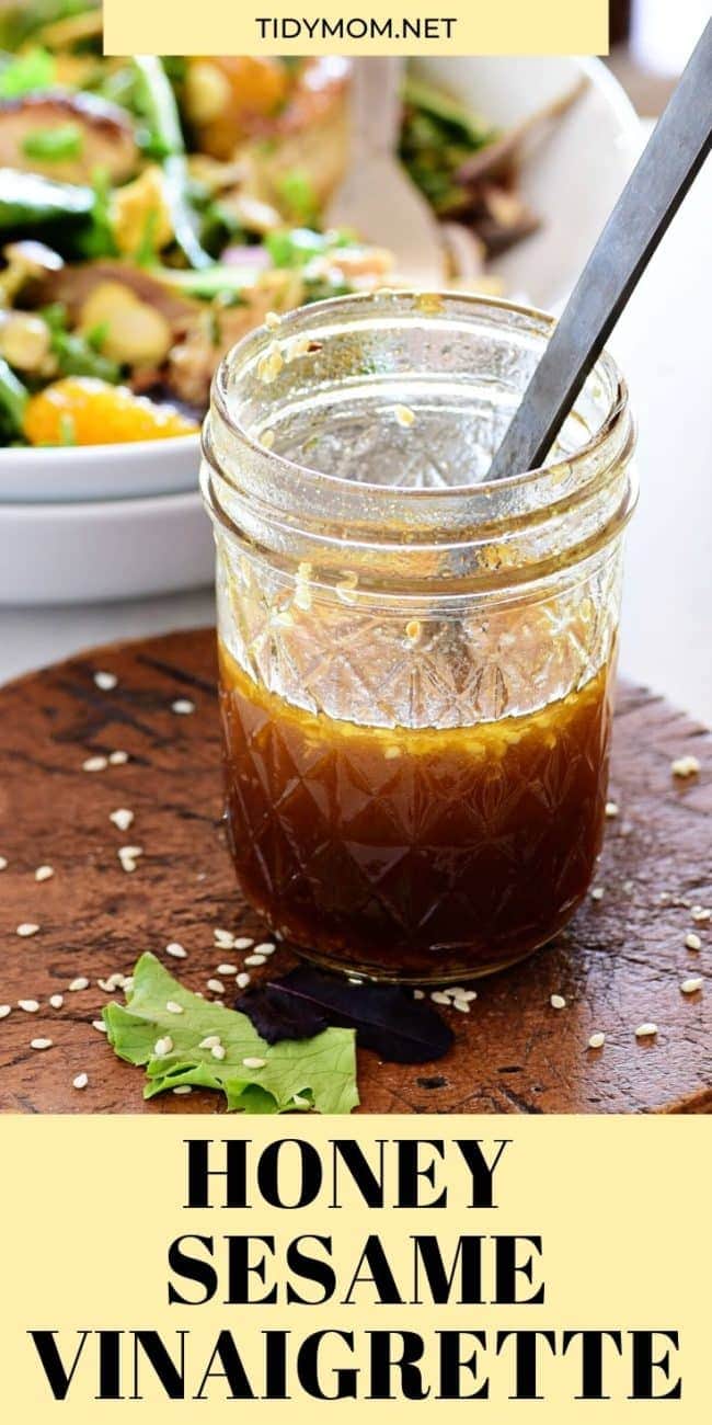 canning jar with Sesame salad dressing and a spoon