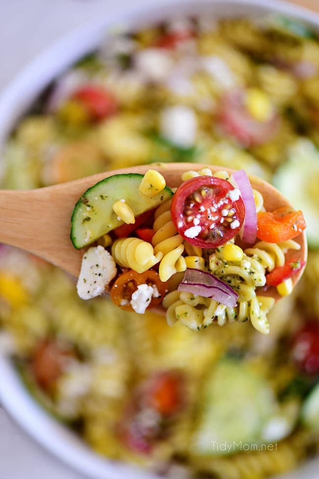 overhead shot of summer pasta salad on a spoon