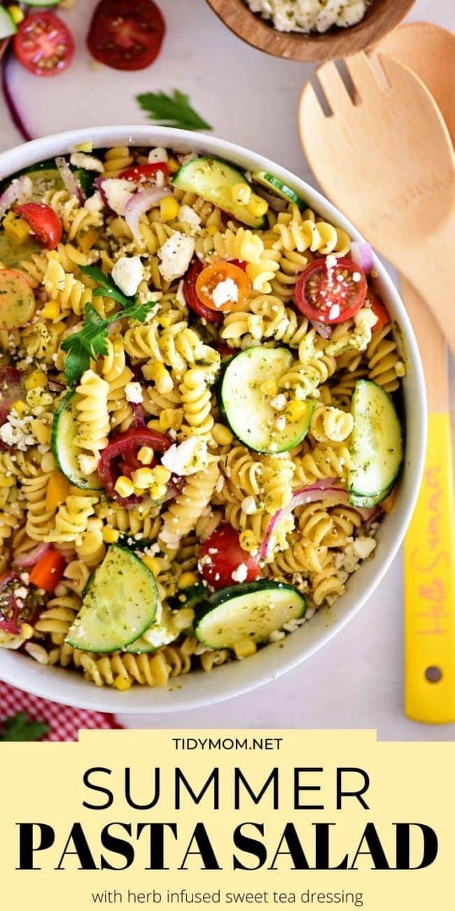overhead shot of summer pasta salad in a white bowl