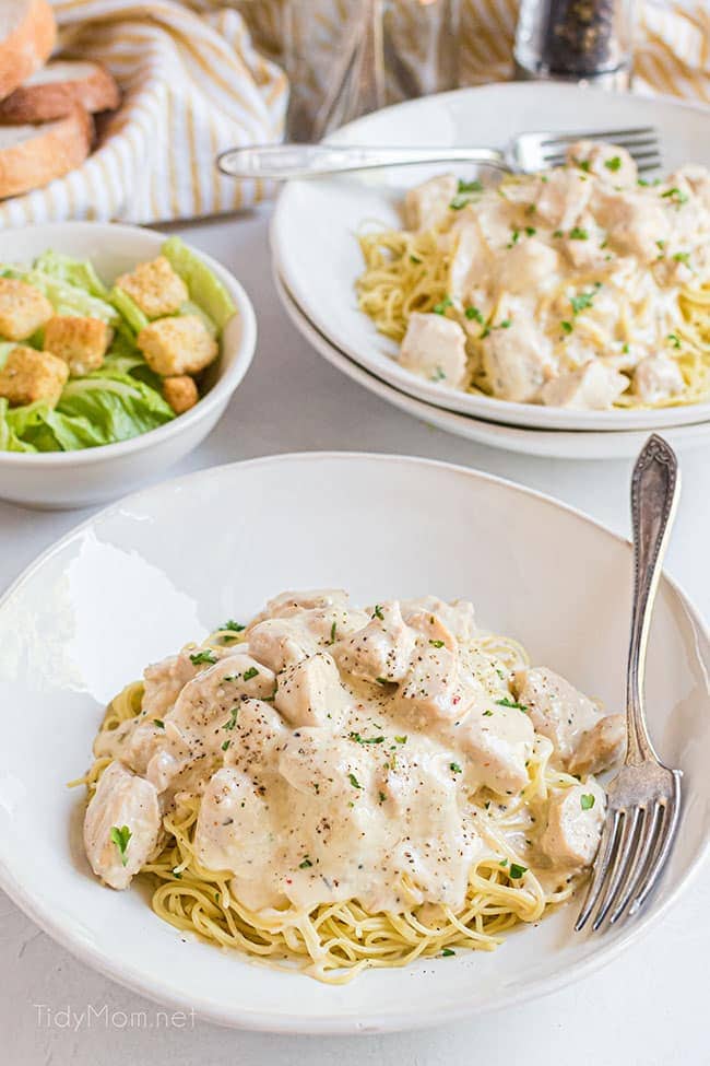 creamy chicken on plates with forks