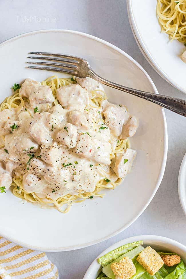 creamy chicken on a plate with a fork