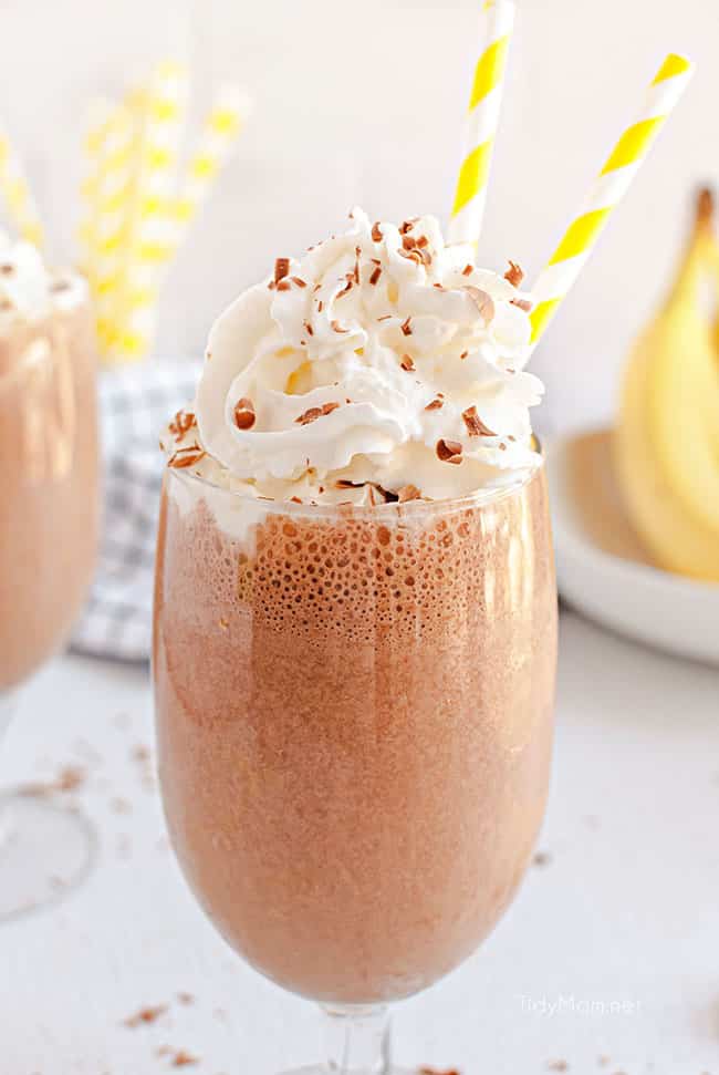 milkshakes with yellow straws and chocolate sprinkles