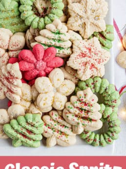 holiday spritz cookies on white platter