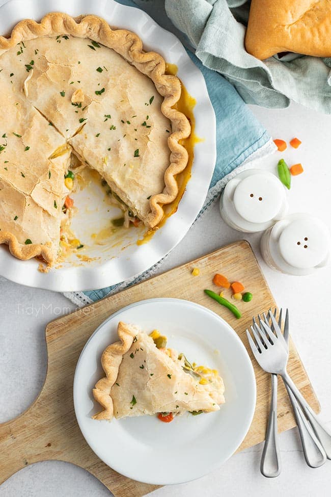 overhead shot of pot pie in a dish with a serving on a plate