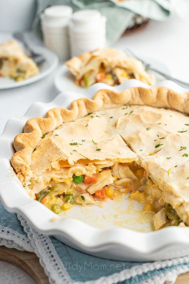 Chicken pot pie in dish with 2 servings removed