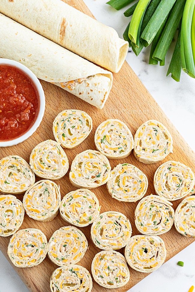 rollup sandwiches on a wood board