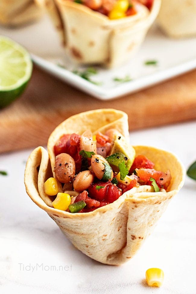 baked tortilla cup filled with cowboy caviar