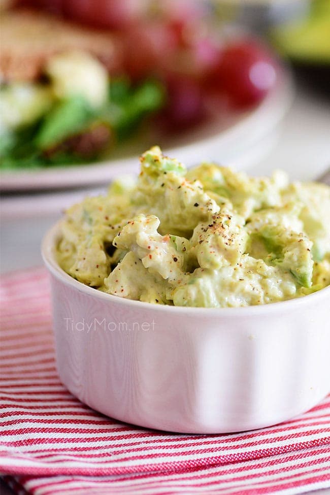 a bowl of avocado chicken salad sandwich