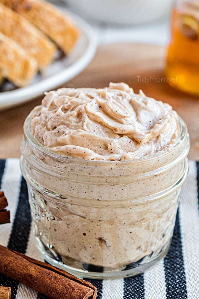 jar of honey butter on striped towel