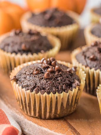 cake mix pumpkin muffins on a wood serving board