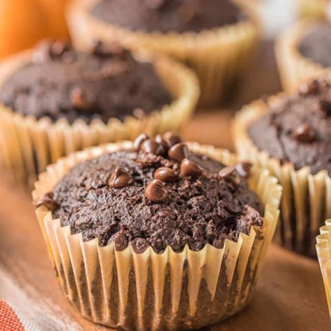 cake mix pumpkin muffins on a wood serving board