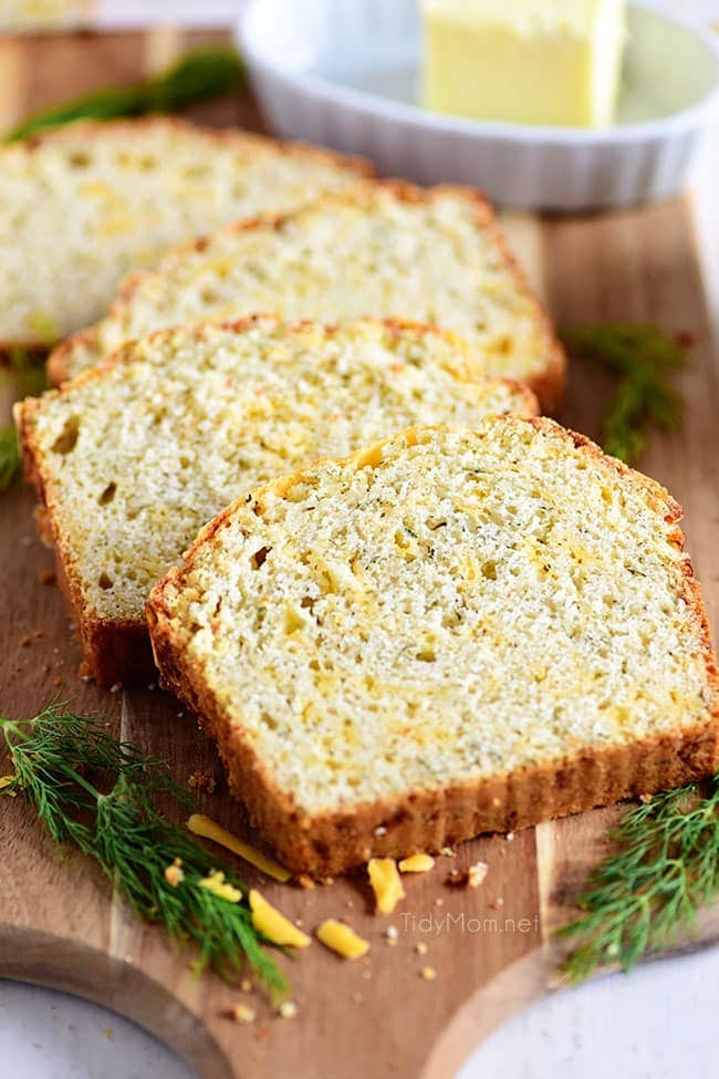 slices of dilly cheese bread with fresh dill garnish