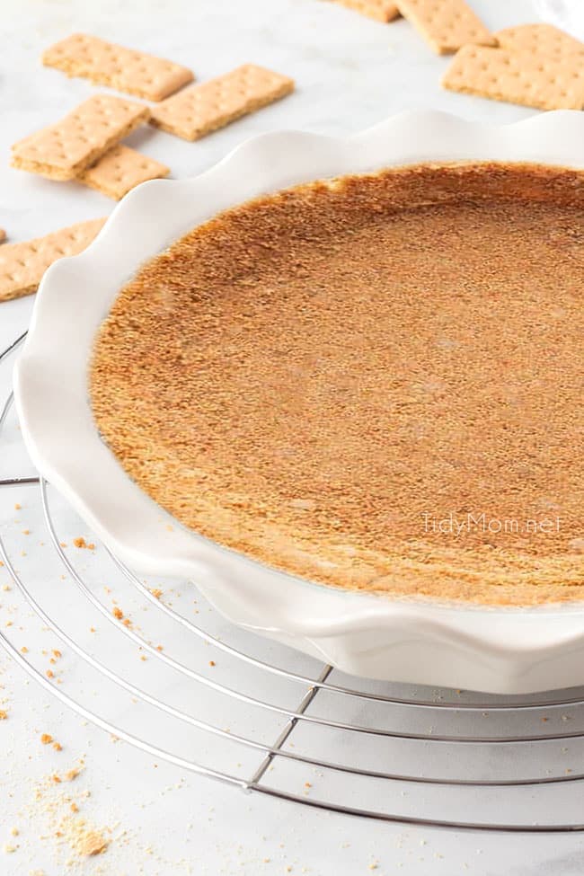 Classic graham cracker crust in a white pie plate
