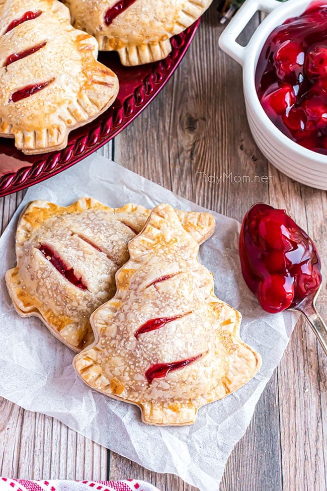 Cherry hand pies with pillsbury pie crust with a spoonful of cherry pie filling