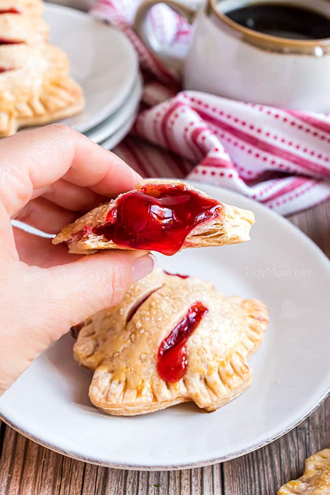 pie filling oozing out of Holiday Tree Cherry Hand Pie