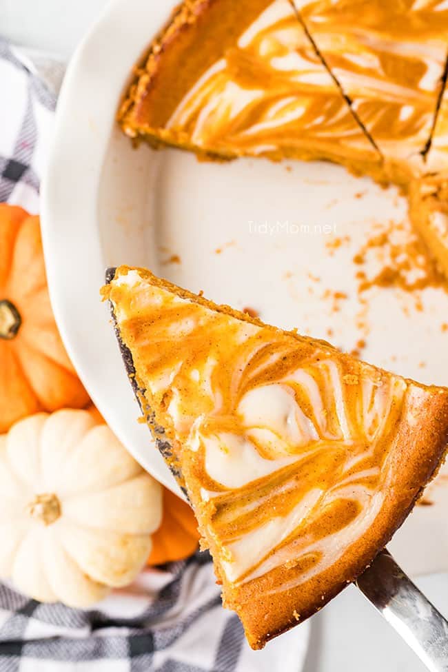 slice of pumpkin cheesecake pie