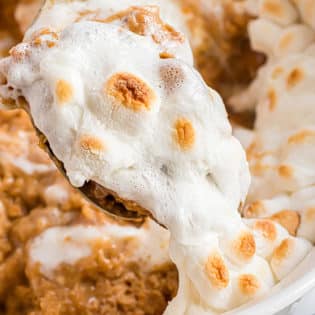 spoonful of sweet potato casserole with marshmallows