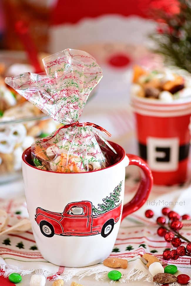 Christmas snack mix in a mug for a gift