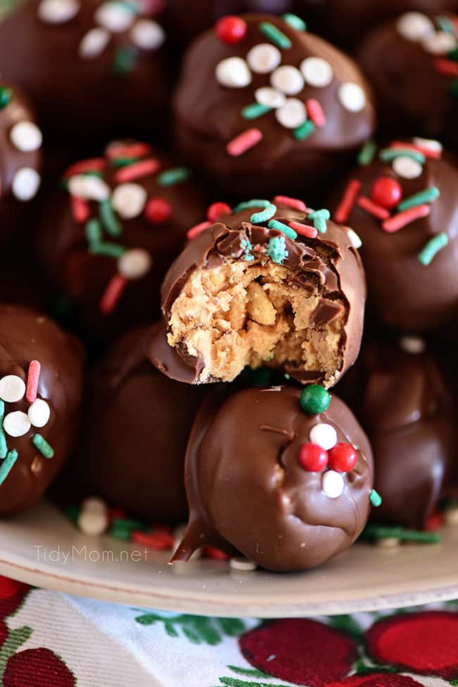 chocolate peanut butter balls with Christmas sprinkles