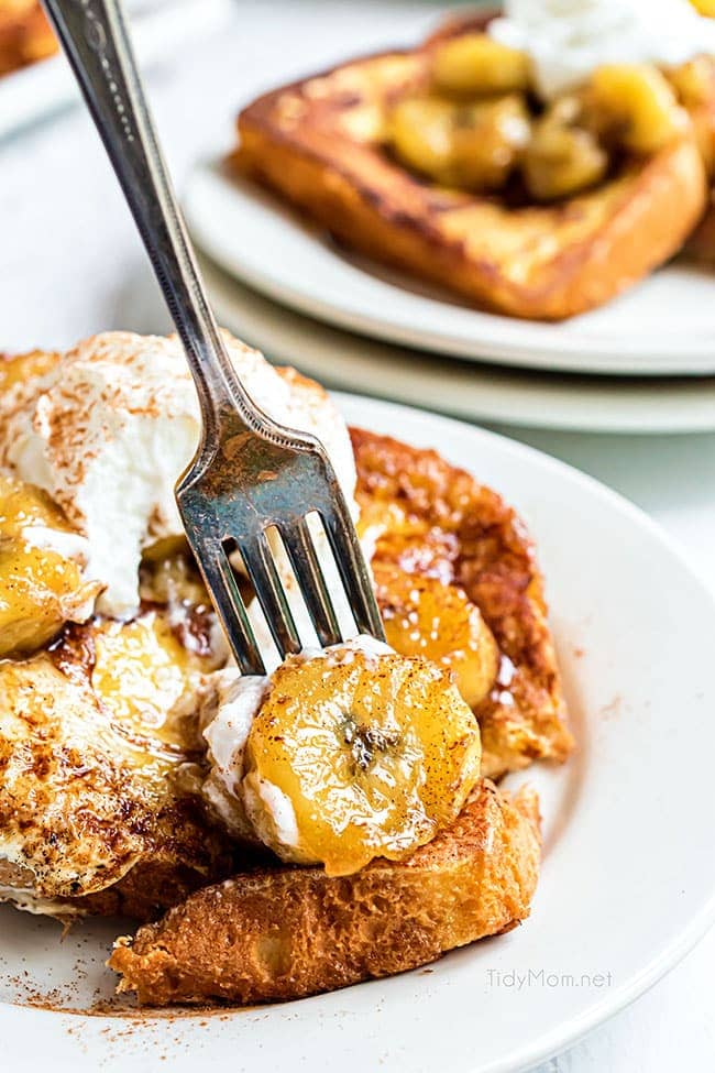 bananas foster french toast on a fork