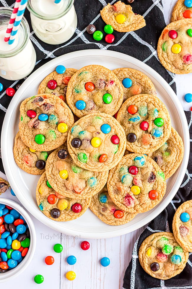 homemade m&m cookies on a white platter
