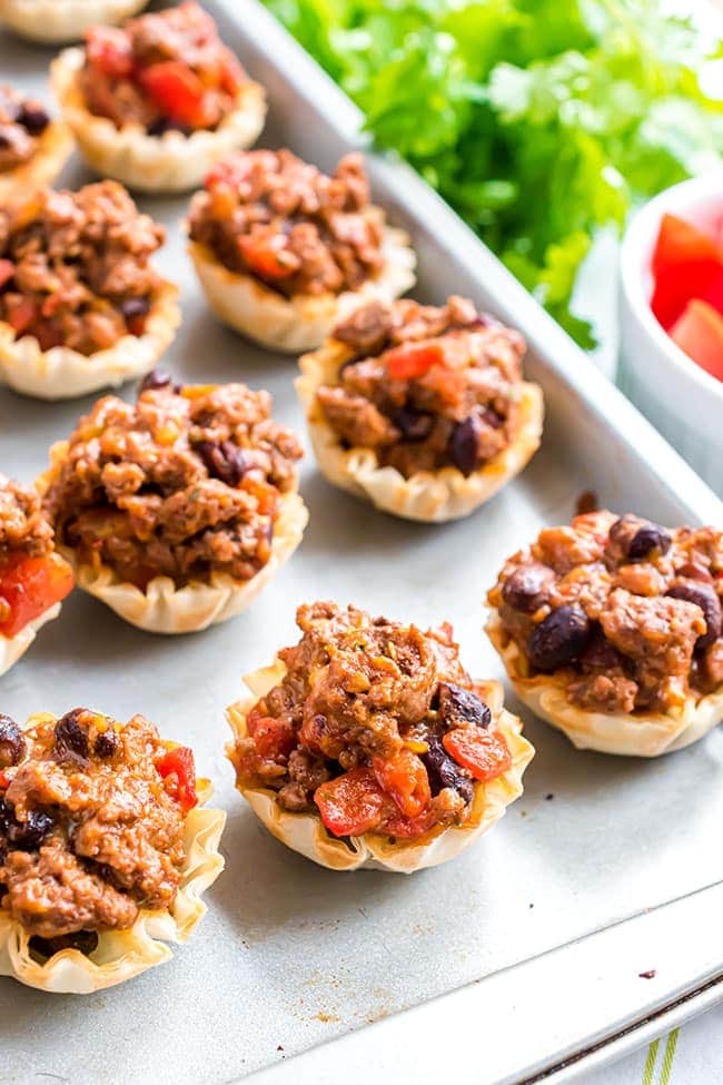 oven-baked phyllo cup taco bites on a sheet pan