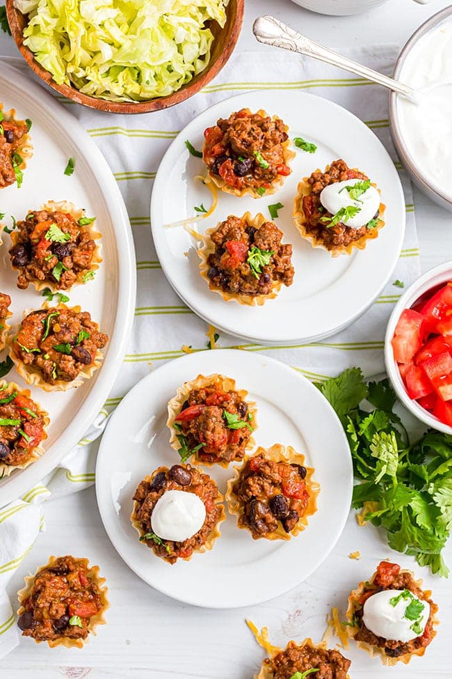 overhead shot of mini taco appetizers in phyllo cups