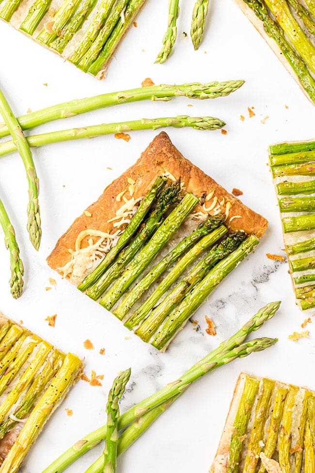 Asparagus tart with gruyere on a counter