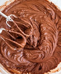 a bowl of chocolate buttercream frosting