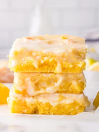 stack of easy lemon brownies on a counter