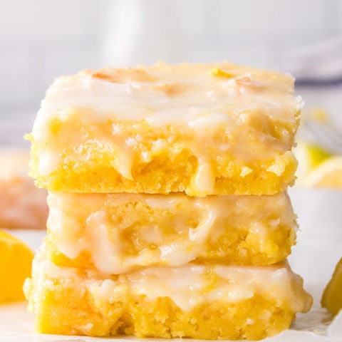 stack of easy lemon brownies on a counter
