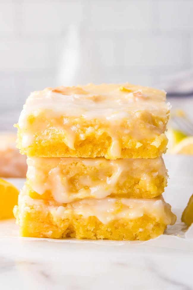 stack of easy lemon brownies on a counter