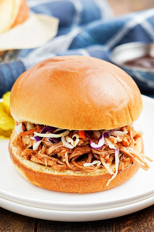 Slow Cooker Pulled BBQ Chicken Sandwiches topped with coleslaw