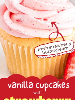 close up of vanilla cupcake with strawberry frosting