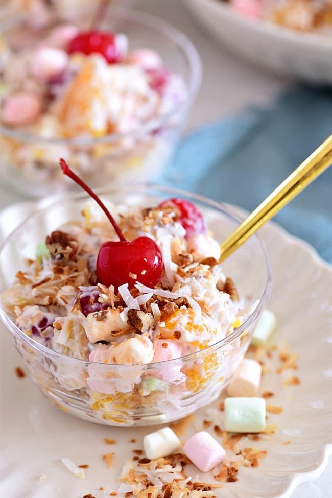 Vintage ambrosia salad recipe served in dessert cups with a gold spoon