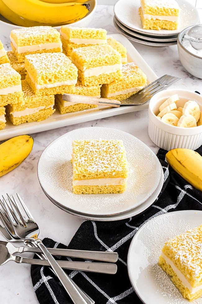 servings of Old Fashioned Banana Flips on plates on a table with a black napkin